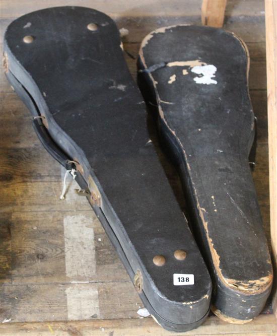 2 violins in cases(-)